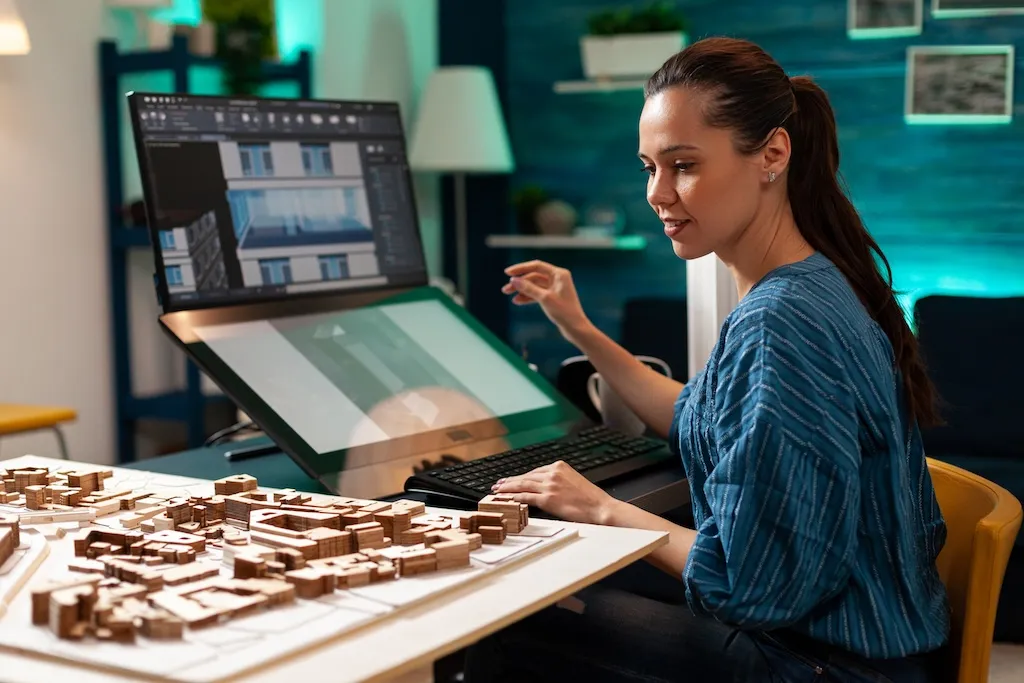 Engineer reviewing a building model for material take-off